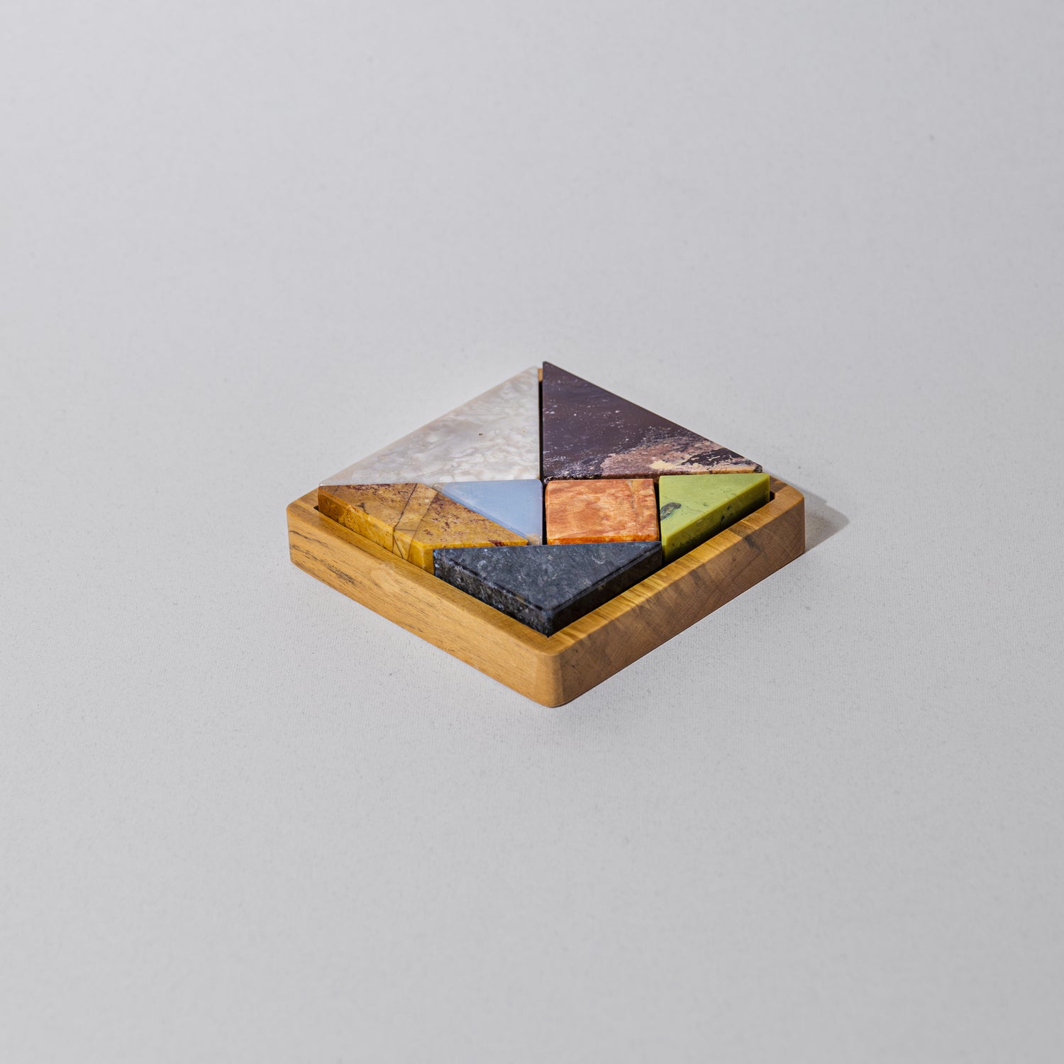 Tangram Gemstone Puzzle. Gemstones include Celestine, Serpentine, Jasper, Soapstone.