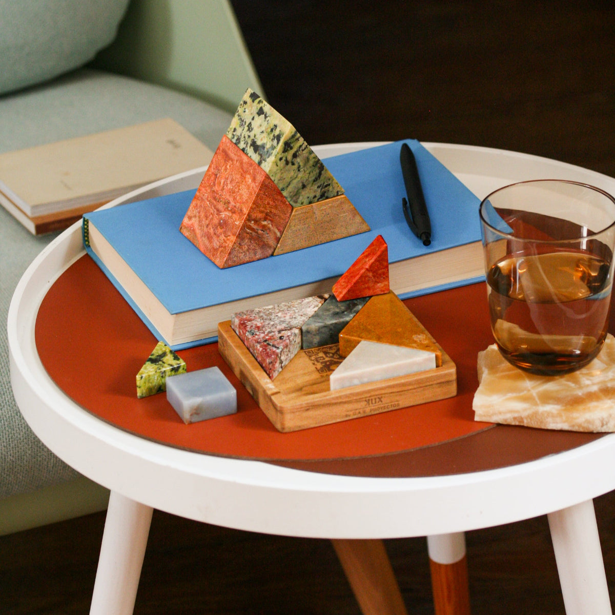 Triangle Stone table-top puzzle with black onyx, green serpentine and orange jasper stone - great sculptural piece for the coffee table