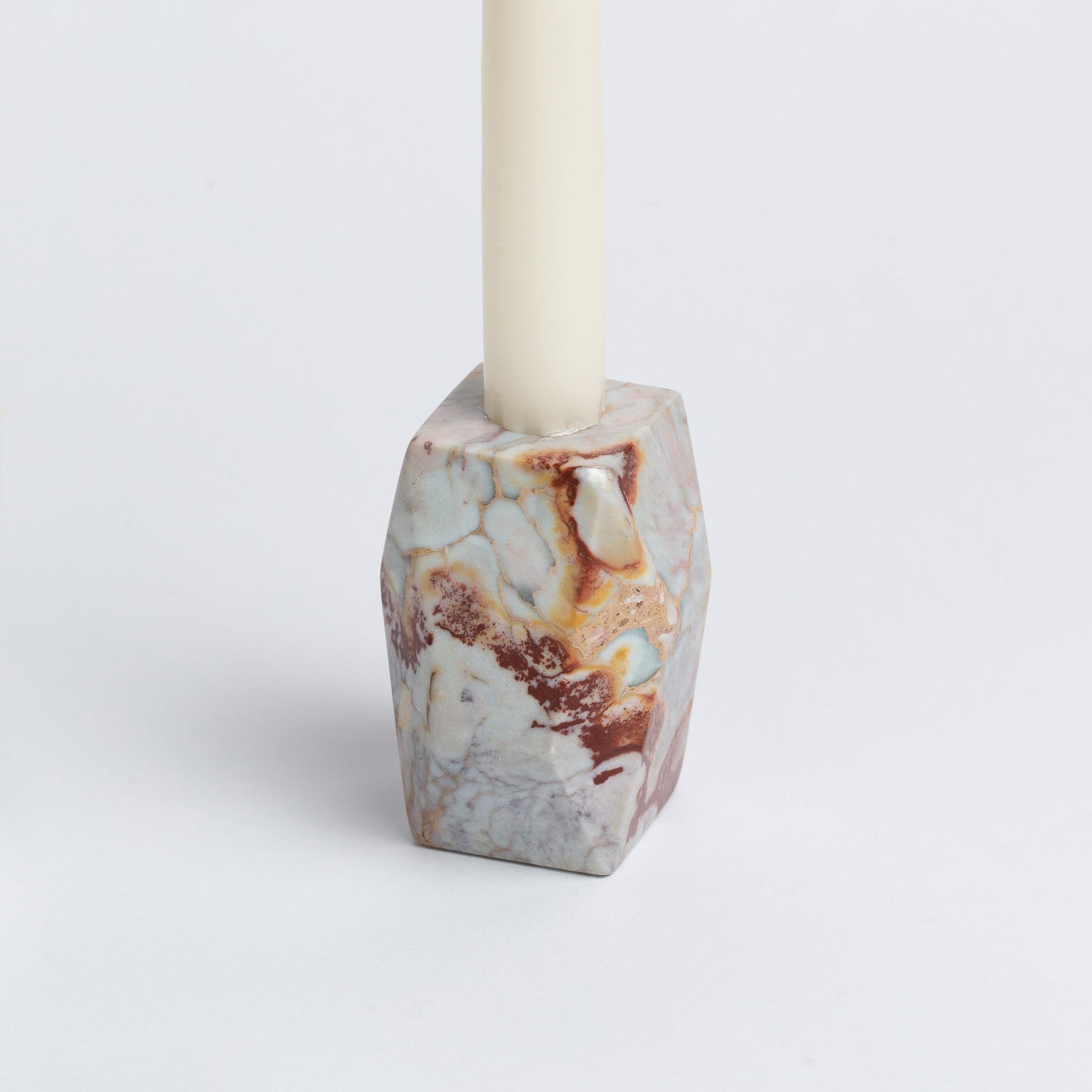 Gemstone faceted candelabra - soapstone. A nod to geology and real stone shapes, the candelabra is perfect for hosting and entertaining.