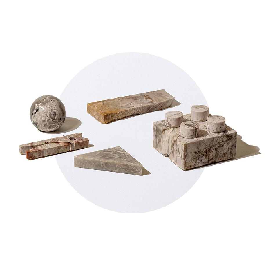 Semi-precious gemstone puzzle pieces, handcarved from creamy soapstone