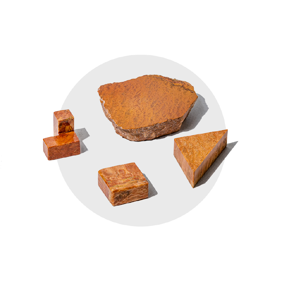 Semi-precious gemstone puzzle pieces, handcarved from Semi-precious gemstone puzzle pieces, handcarved from orange jasper