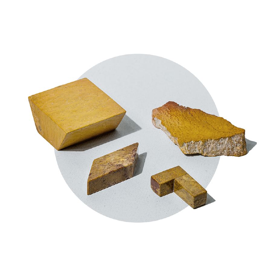 Semi-precious gemstone puzzle pieces, handcarved from yellow jasper
