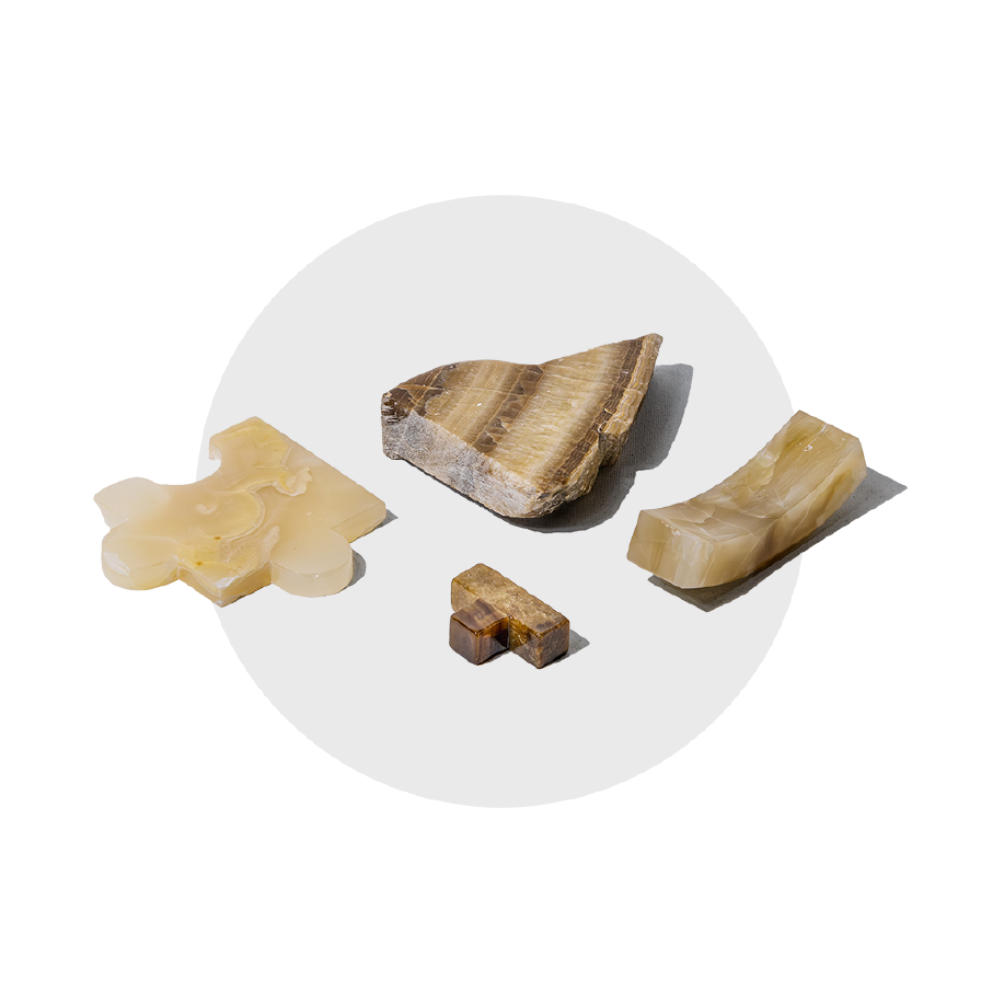 Semi-precious gemstone puzzle pieces, handcarved from white onyx