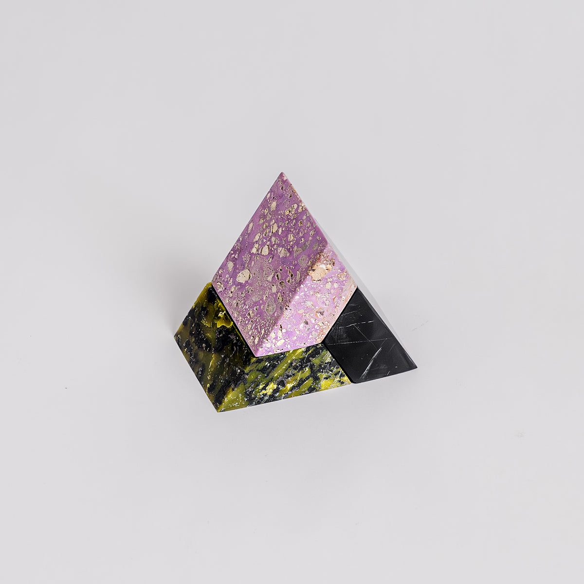 Handcrafted Triangle Gemstone Puzzle in Lila Black, a unique brain teaser and decor piece.