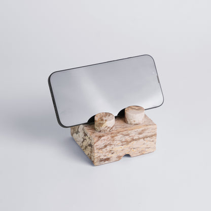 Creamy soapstone brick phone stand holder showcasing its smooth natural finish on a white background.
