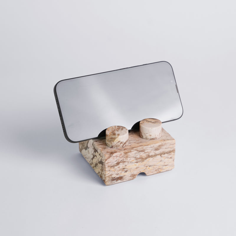 Creamy soapstone brick phone stand holder showcasing its smooth natural finish on a white background.