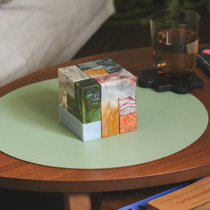 Extra-large Soma cube puzzle acting as a dominant sculptural element in a refined interior.