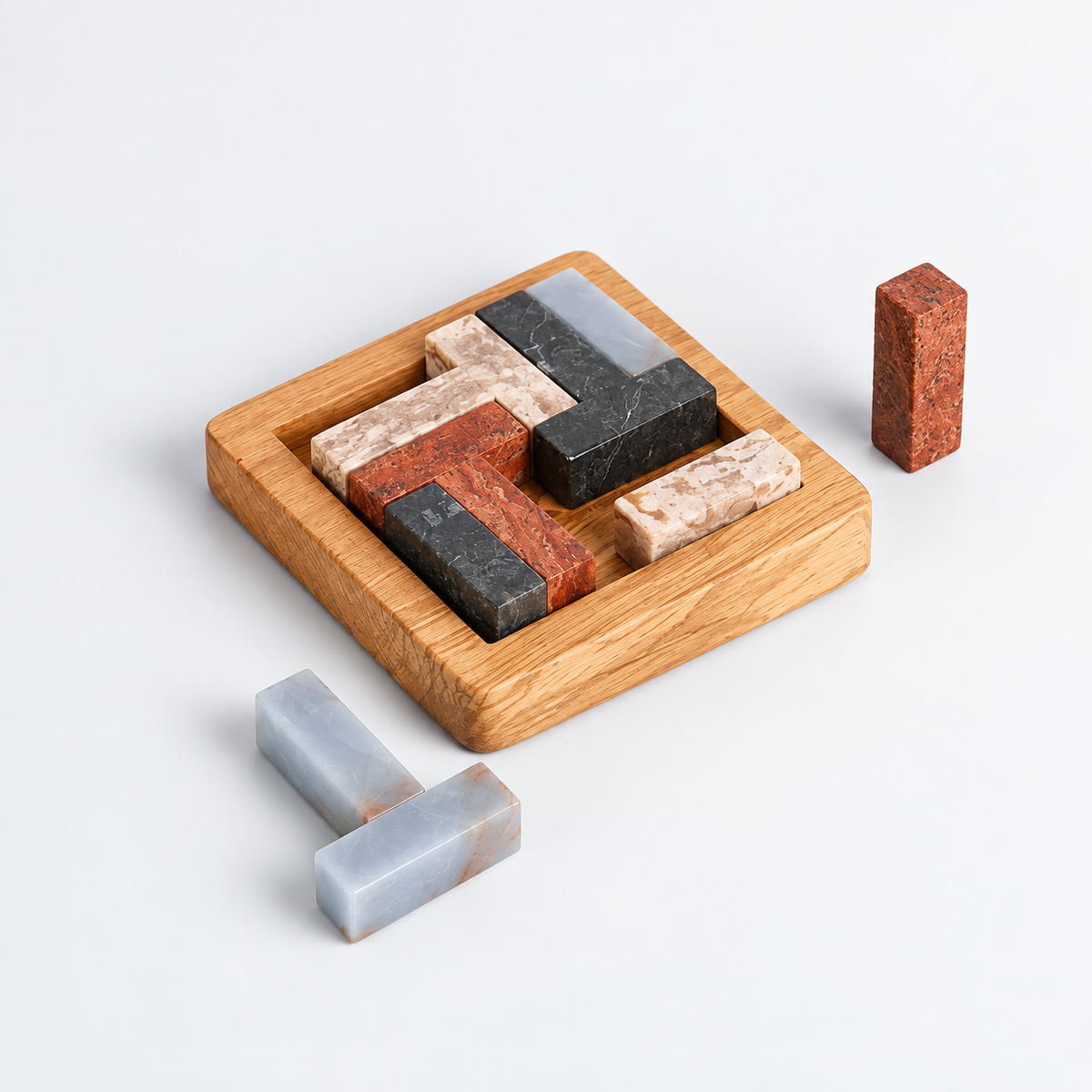 Multi-stone 3D Tetris gemstone puzzle showcasing a vibrant array of natural Andean colors on a white background.