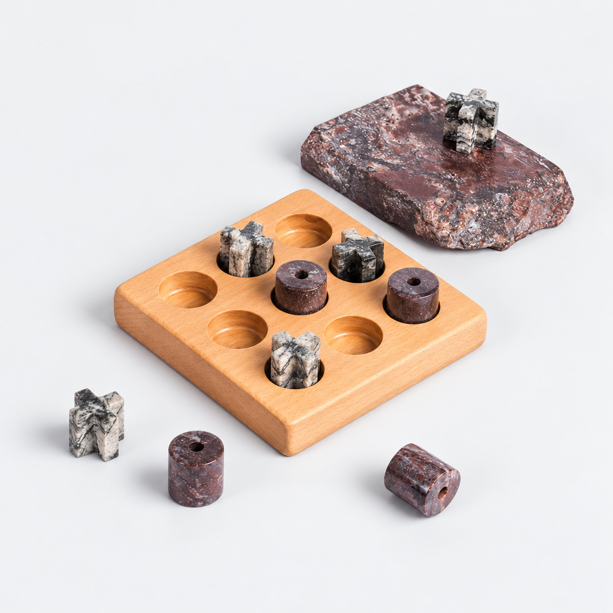 Handcrafted gemstone Tic Tac Toe puzzle game showcasing natural mineral textures on a white background.