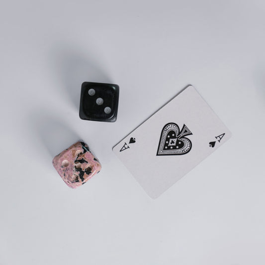 Giant gemstone Dice - set of 2 - Pink-Rhodonite-_Black-Onyx. Roll in style with gemstone Dice, made from genuine semi-precious stones.