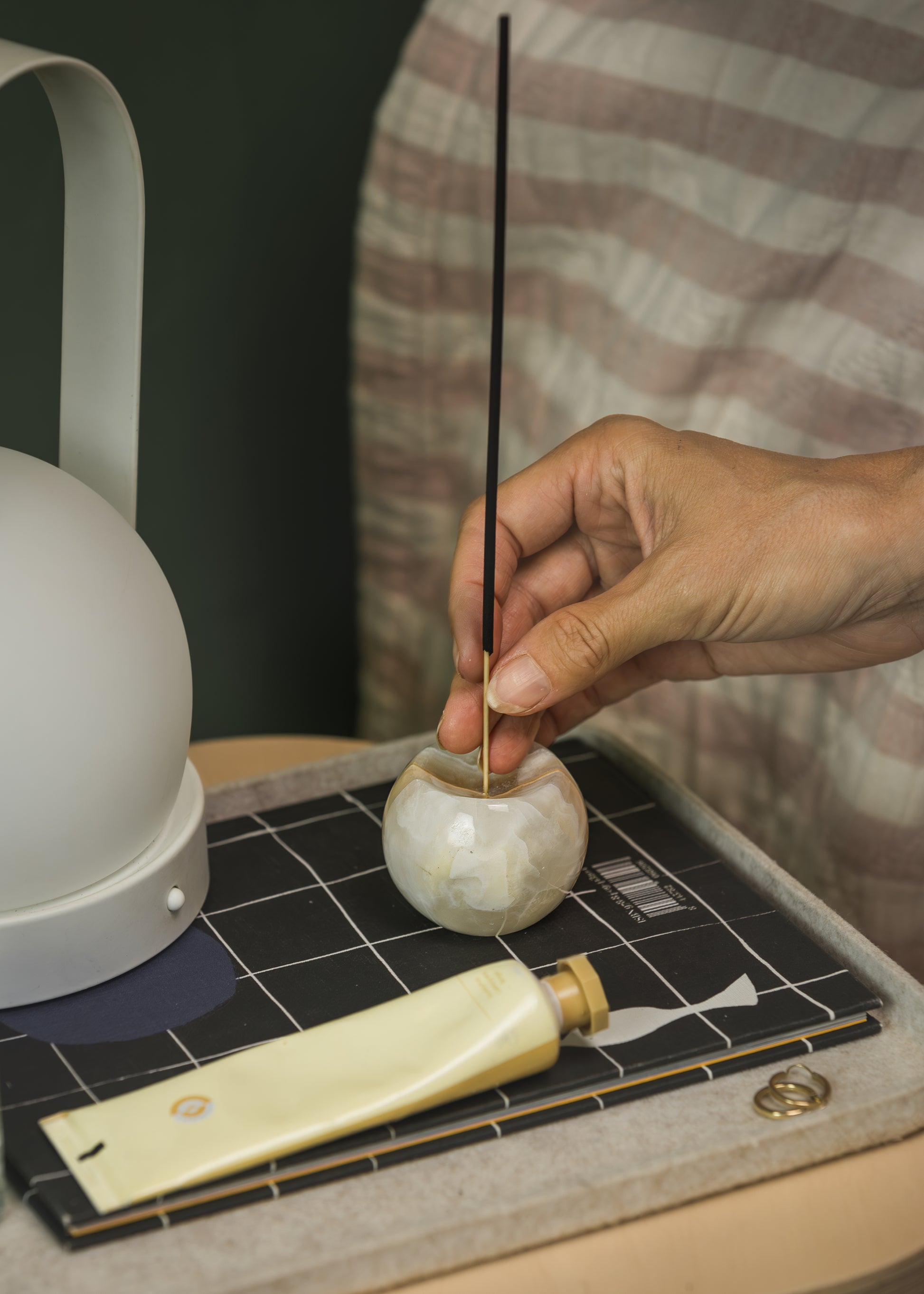 Gemstone sphere incense holder in Onyx Crema - develop relaxing routines charged wtih gemstone energies by adding special elements like these to home.